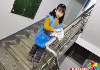 青少年志愿者進(jìn)白川 社區(qū)環(huán)境整潔促文明
